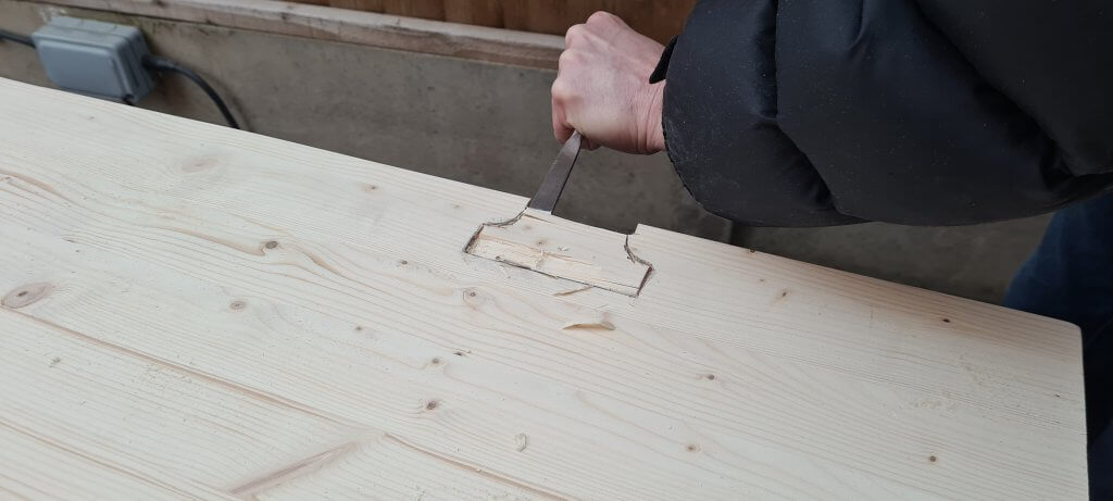 Chopping out the parliament hinge housing