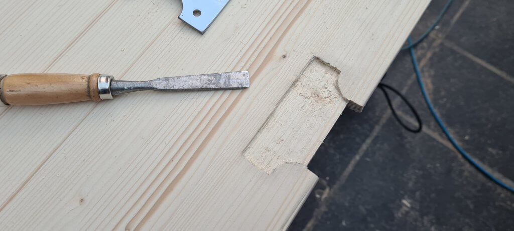 The housing for the parliament hinge chopped out with a chisel
